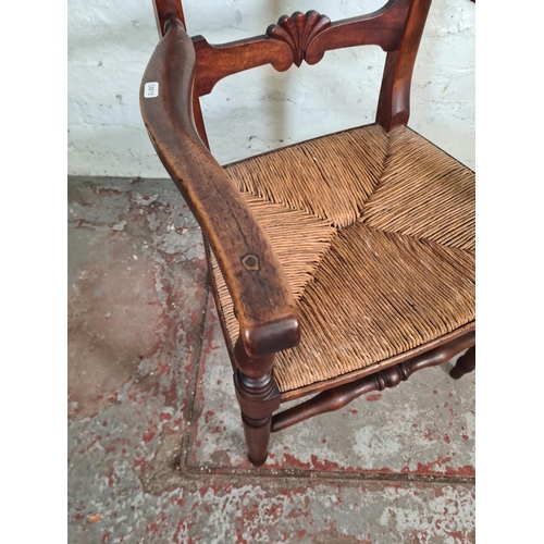 96 - A 19th century mahogany and rush seated armchair - approx. 83cm high x 51cm wide x 43cm deep