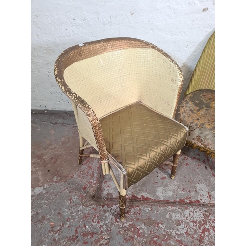 97 - Two mid 20th century chairs, one Lloyd Loom wicker and floral upholstered and one rattan effect