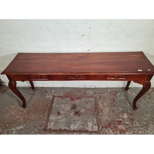 99 - A modern hardwood rectangular three drawer console table on cabriole supports - approx. 75cm high x ... 