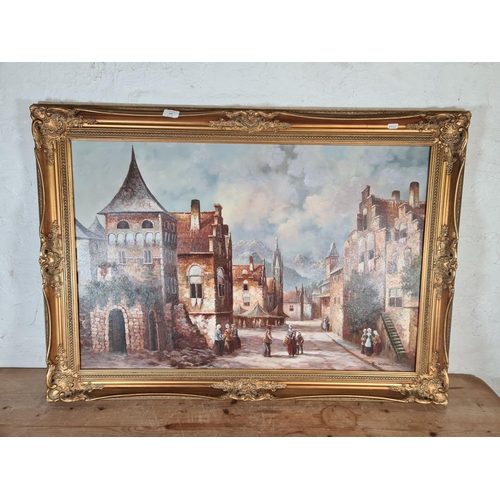 149 - A gilt framed oil on canvas of a town scene, signed lower right G. Schroter - approx. 106cm wide x 7... 