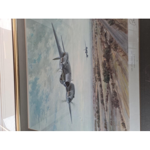 157 - Two framed Gerald Coulson prints to include Low Level Strike pencil signed print etc.