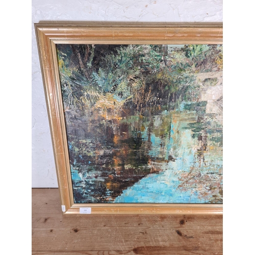 162 - A framed oil on board titled Bridge At Tatton by E. Chiverton - approx. 73cm wide x 58cm high