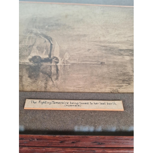 183 - A late 19th/early 20th century oak framed William Turner print of The Fighting Temeraire Being Towed... 