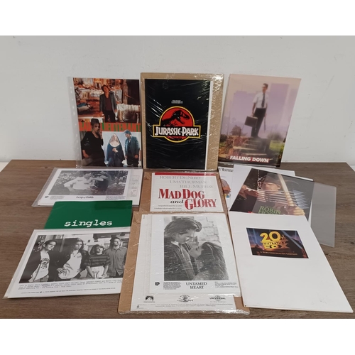 788 - A collection of film promotional items to include Jurassic Park, Rough Magic, Untamed Heart, So I Ma... 