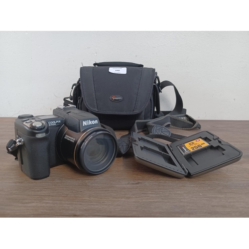 648 - A cased Nikon Coolpix 5700 5.0mp digital camera with strap, cable, cased 256mb flash card and fitted... 