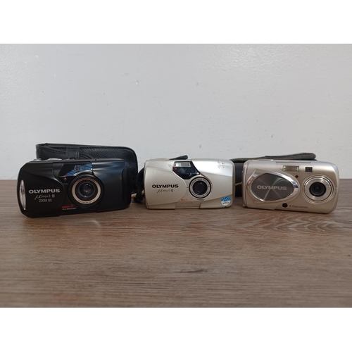 653 - Three cased Olympus mju compact cameras, one µ[mju:]-II Zoom 80 35mm, one µ[mju:]-II 35mm and one µ ... 