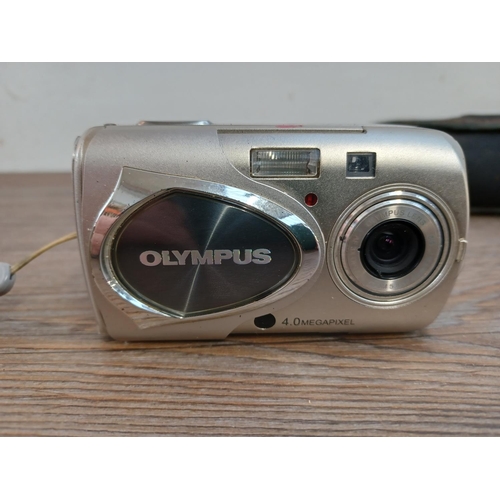 653 - Three cased Olympus mju compact cameras, one µ[mju:]-II Zoom 80 35mm, one µ[mju:]-II 35mm and one µ ... 