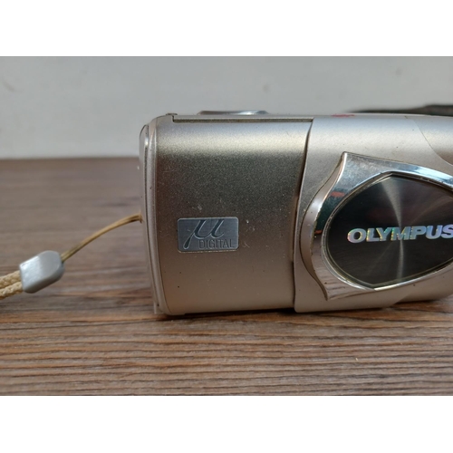 653 - Three cased Olympus mju compact cameras, one µ[mju:]-II Zoom 80 35mm, one µ[mju:]-II 35mm and one µ ... 