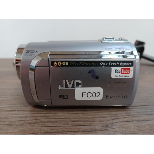 655 - Five digital camcorders to include JVC Everio HDD, Samsung, Alba HD etc.