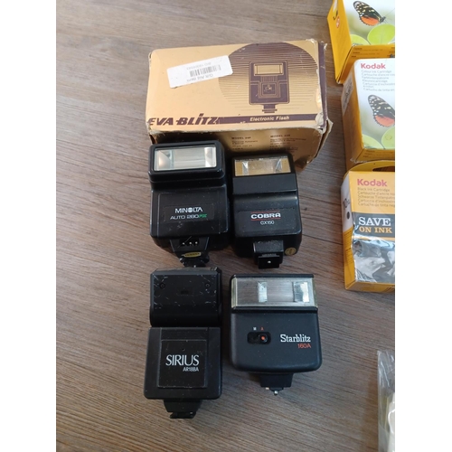 656 - A collection of items to include boxed vintage Photax Solar slide viewer, ink cartridges, Nokina cam... 