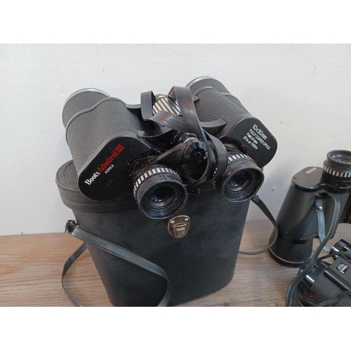 657 - A large collection of binoculars to include cased Boots Admiral 10 x 50, cased Rand Royal-View No.2 ... 