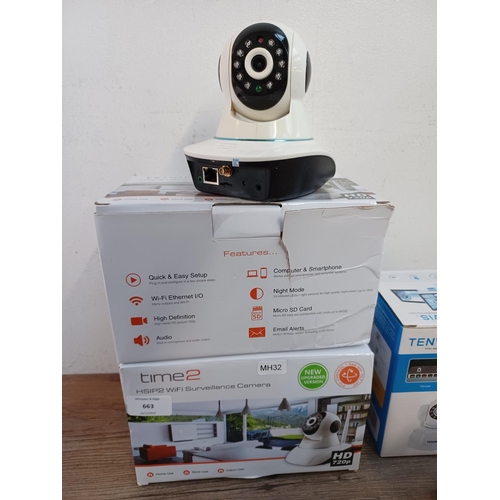 663 - Three boxed items, two Time2 HSIP2 WiFi Surveillance cameras and one pair of Tenvis wireless network... 