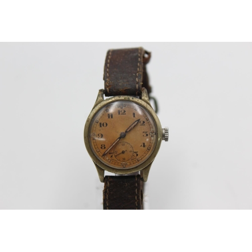 1129 - A WWII military issue A.T.P mechanical wristwatch, case back engraved Broad Arrow, A.T.P, Code 23602... 