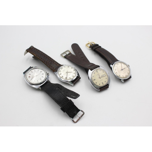 1140 - Four vintage men's wristwatches to include Caravelle by Bulova, Astral etc.