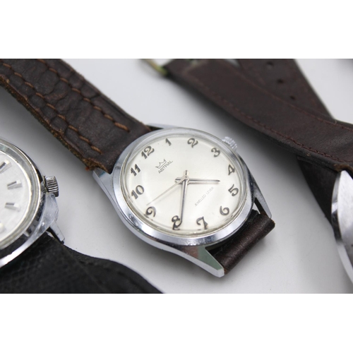 1140 - Four vintage men's wristwatches to include Caravelle by Bulova, Astral etc.