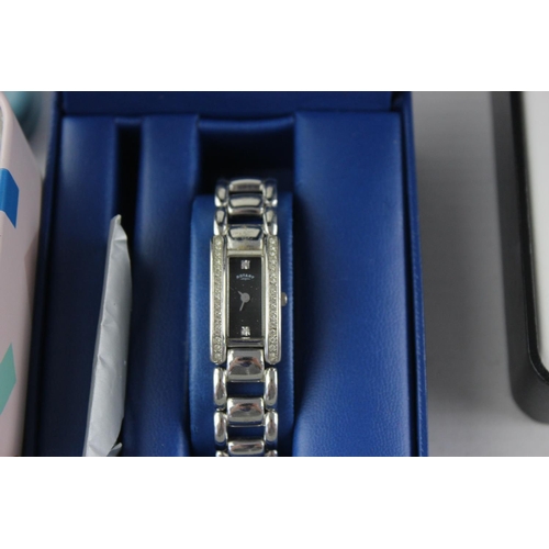 1146 - Four boxed stainless steel quartz women's wristwatches to include Rotary, Tissot etc.