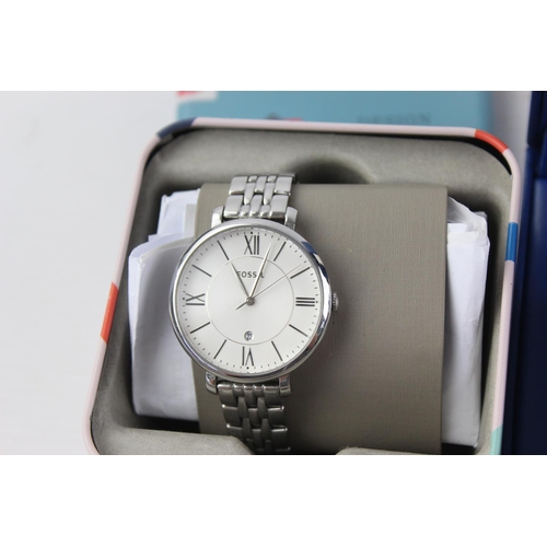 1146 - Four boxed stainless steel quartz women's wristwatches to include Rotary, Tissot etc.