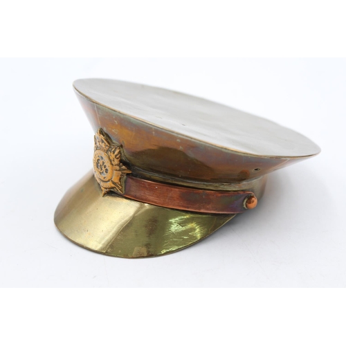 1177 - A WWII trench art brass soldiers cap - approx. 12.5cm diameter