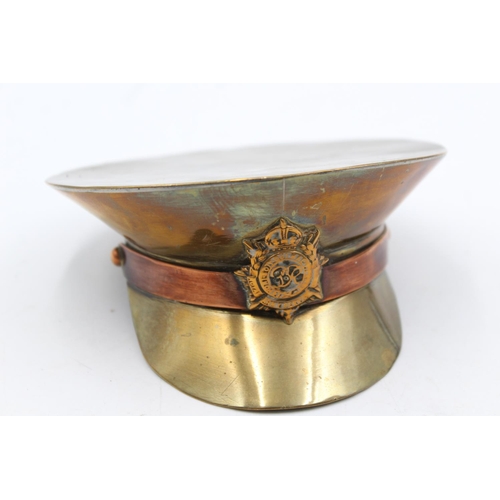 1177 - A WWII trench art brass soldiers cap - approx. 12.5cm diameter