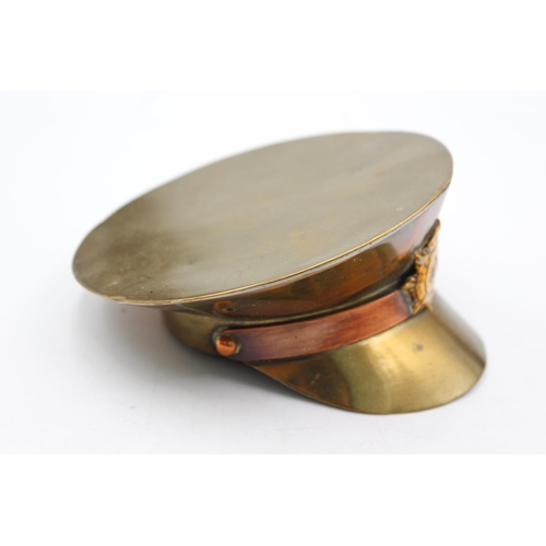 1177 - A WWII trench art brass soldiers cap - approx. 12.5cm diameter