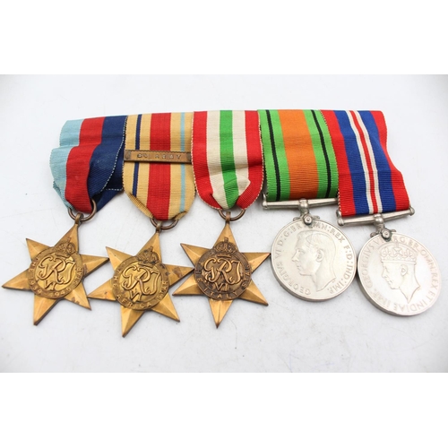 1190 - A WWII mounted medal group to include the Italy Star, the Africa Star etc.