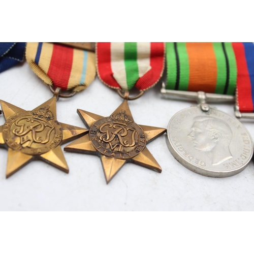 1190 - A WWII mounted medal group to include the Italy Star, the Africa Star etc.