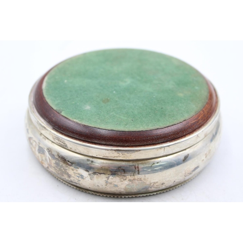 1280 - A Broadway & Co hallmarked Birmingham silver Millennium bottle coaster with wooden base - approx. gr... 