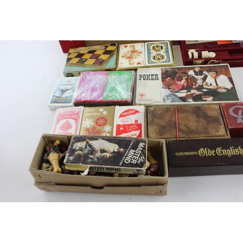 351 - Twenty vintage games to include playing cards, dominoes, backgammon etc.