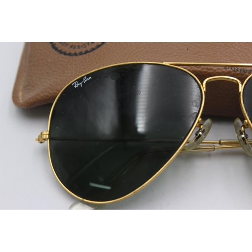 385 - A pair of vintage Bausch & Lomb Ray-Ban gold tone Aviator sunglasses with case