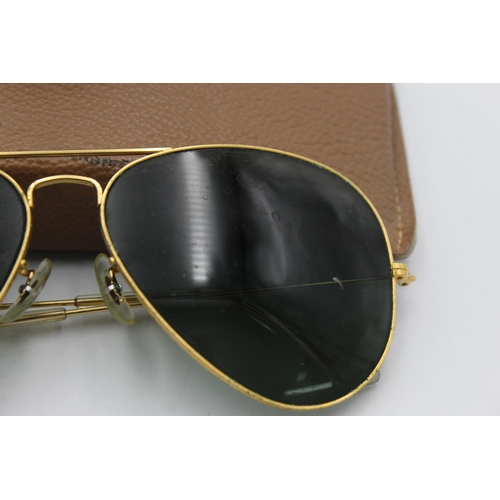 385 - A pair of vintage Bausch & Lomb Ray-Ban gold tone Aviator sunglasses with case