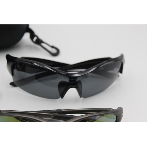 389 - Three pairs of Oakley sunglasses