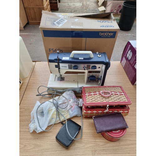 809 - A boxed Jones VX760 electric sewing machine with foot pedal, attachments and accessories