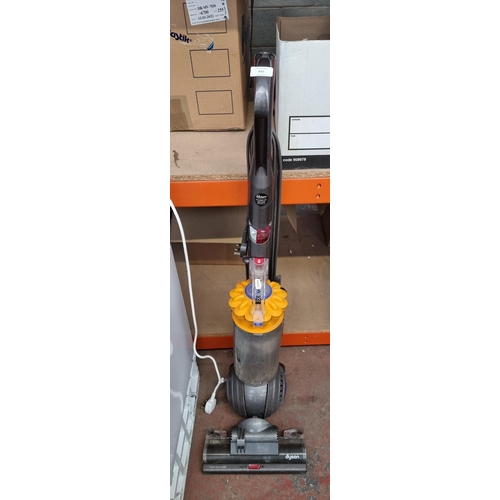 832 - A Dyson DC40 upright bagless vacuum cleaner