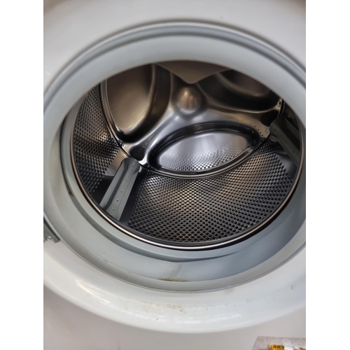 833 - A Whirlpool WWDC9440 9kg A+++ Class 1400rpm washing machine -approx. 60cm wide