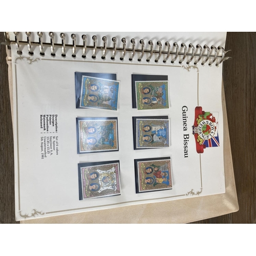 844 - Seven Stanley Gibbons commemorative stamp albums containing Prince Charles and Lady Diana stamps