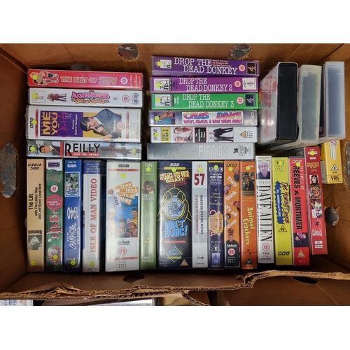 768 - Twelve boxes containing approx. three hundred and seventy VHS video tapes to include music titles, f... 