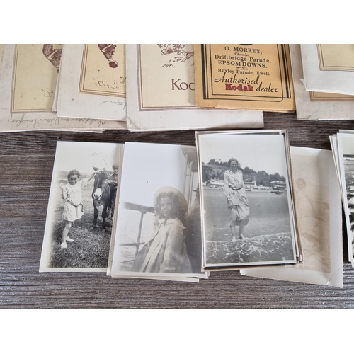 440 - A large collection of antique and vintage black and white photographs