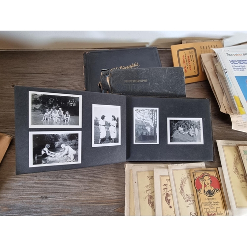 440 - A large collection of antique and vintage black and white photographs