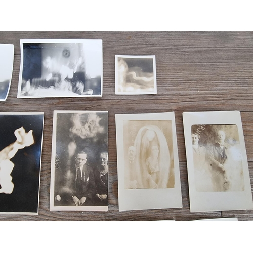 441 - A collection of twelve spirit photographs and fourteen spirit post cards, two dated 1962 to reverse,... 