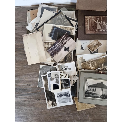 447 - A large collection of antique and vintage black and white photographs