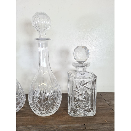 261 - Five cut glass decanters - largest approx. 34cm high