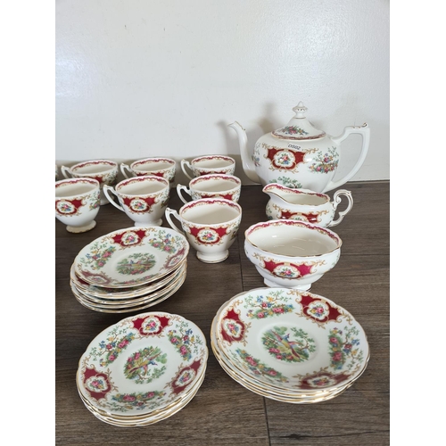 283 - Forty one pieces of Coalport Broadway Marone bone china