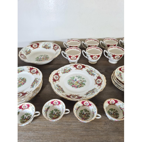 283 - Forty one pieces of Coalport Broadway Marone bone china