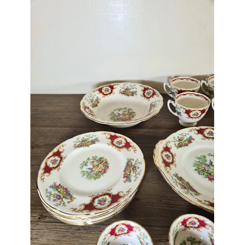 283 - Forty one pieces of Coalport Broadway Marone bone china