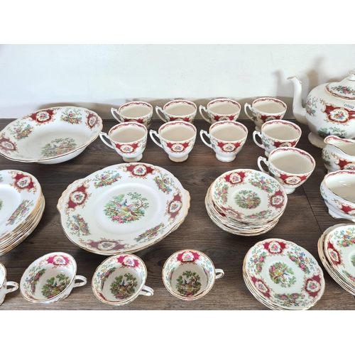 283 - Forty one pieces of Coalport Broadway Marone bone china