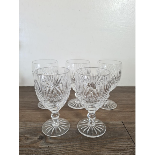 286 - Eight pieces of glassware, five Tutbury sherry glasses, one Stuart 27cm vase, one Caithness candlest... 