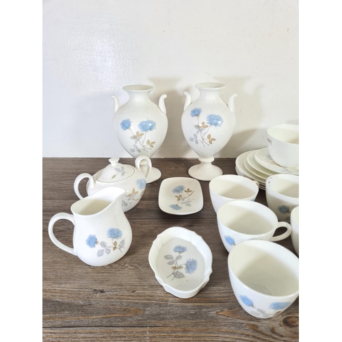 291 - A collection of Wedgwood Ice Rose bone china