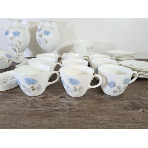 291 - A collection of Wedgwood Ice Rose bone china