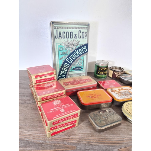 295 - A collection of vintage advertising tins to include Jacob's Cream Crackers, Nescafe Instant Coffee, ... 