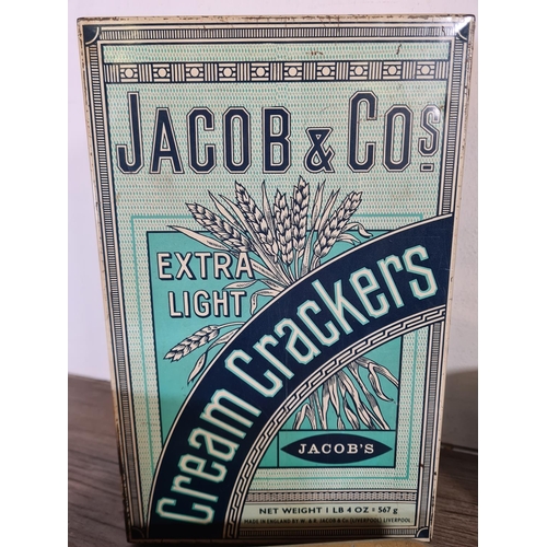 295 - A collection of vintage advertising tins to include Jacob's Cream Crackers, Nescafe Instant Coffee, ... 